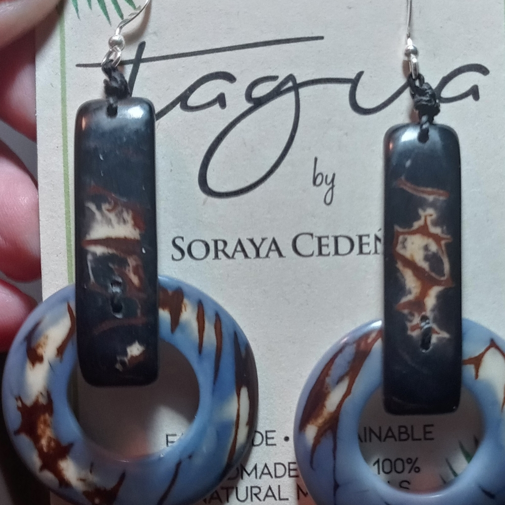 Striking blue dangly earrings with brown etchings
